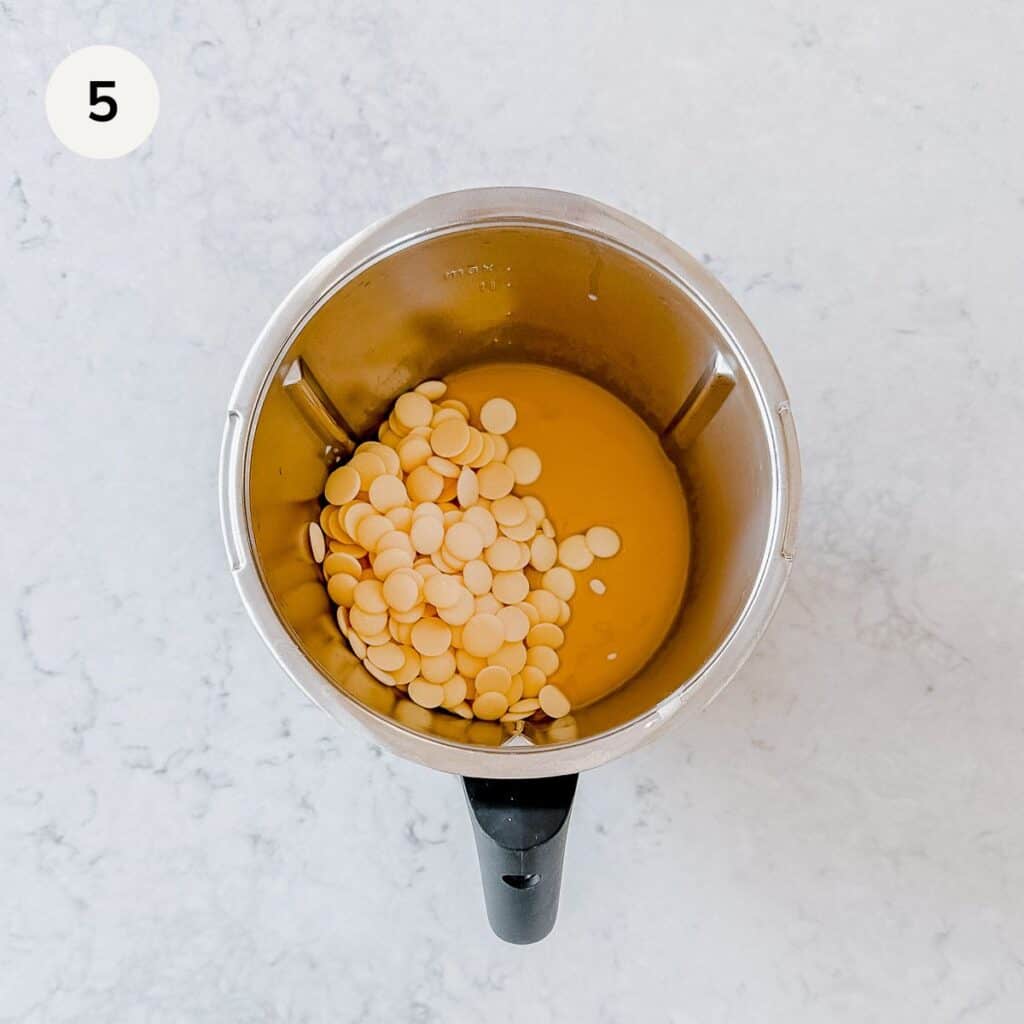 mixing bowl with caramel mixture and white chocolate.