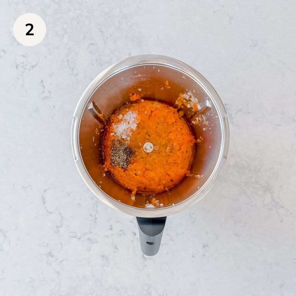 Minced veggies in a metal jug.