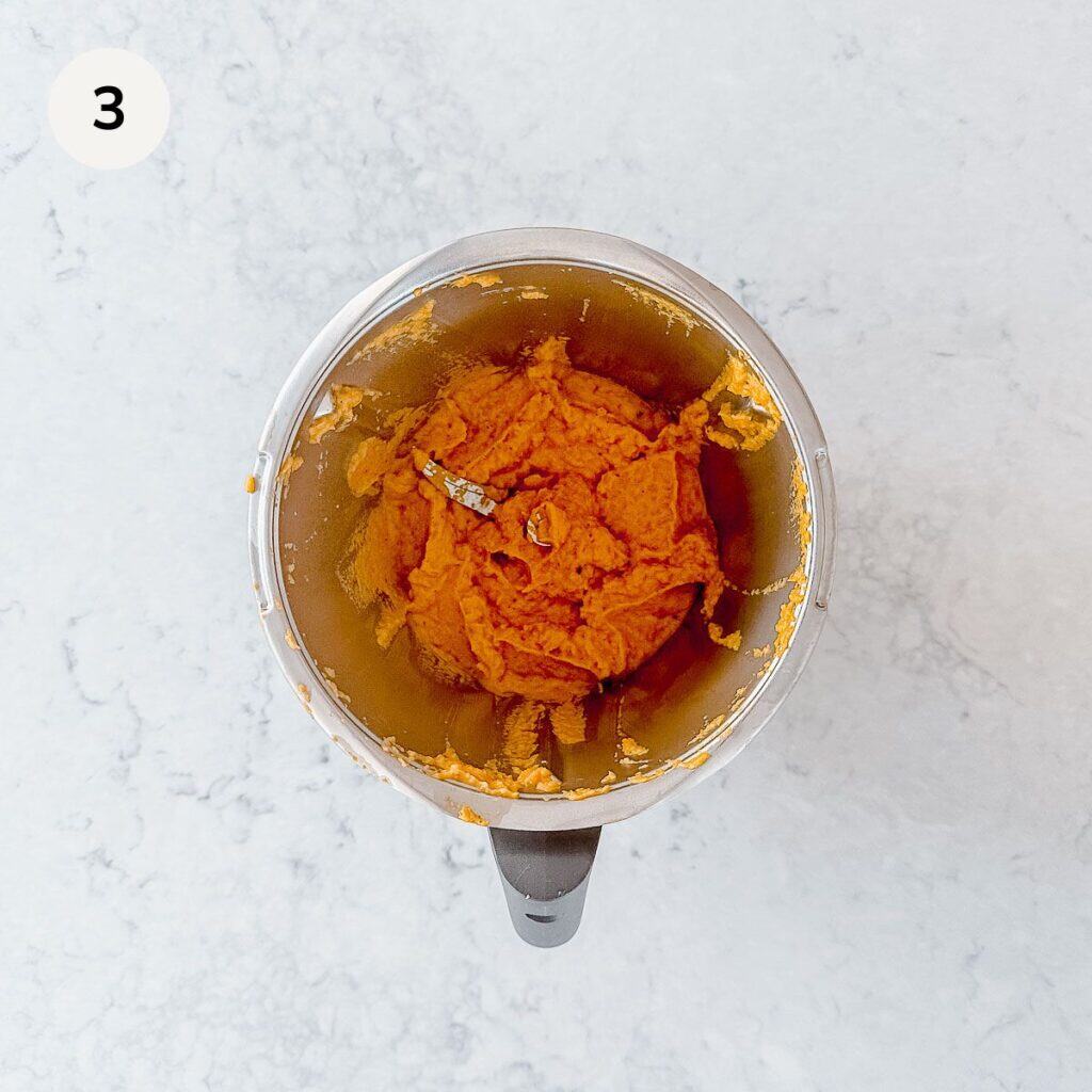 Veggie stock paste in a metal jug.