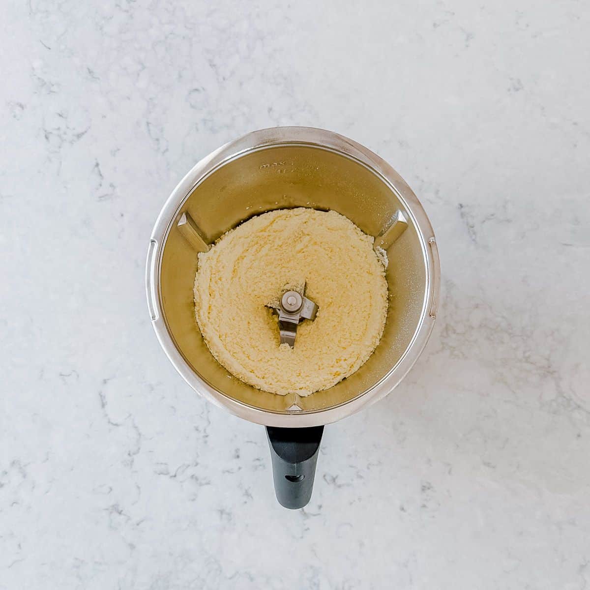 Milk powder in a thermomix bowl.